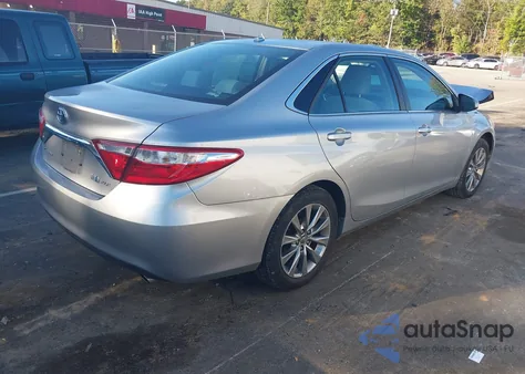 2015 Toyota Camry Hybrid Xle z USA, uszkodzony, nr VIN 4T1BD1FK2FU143167